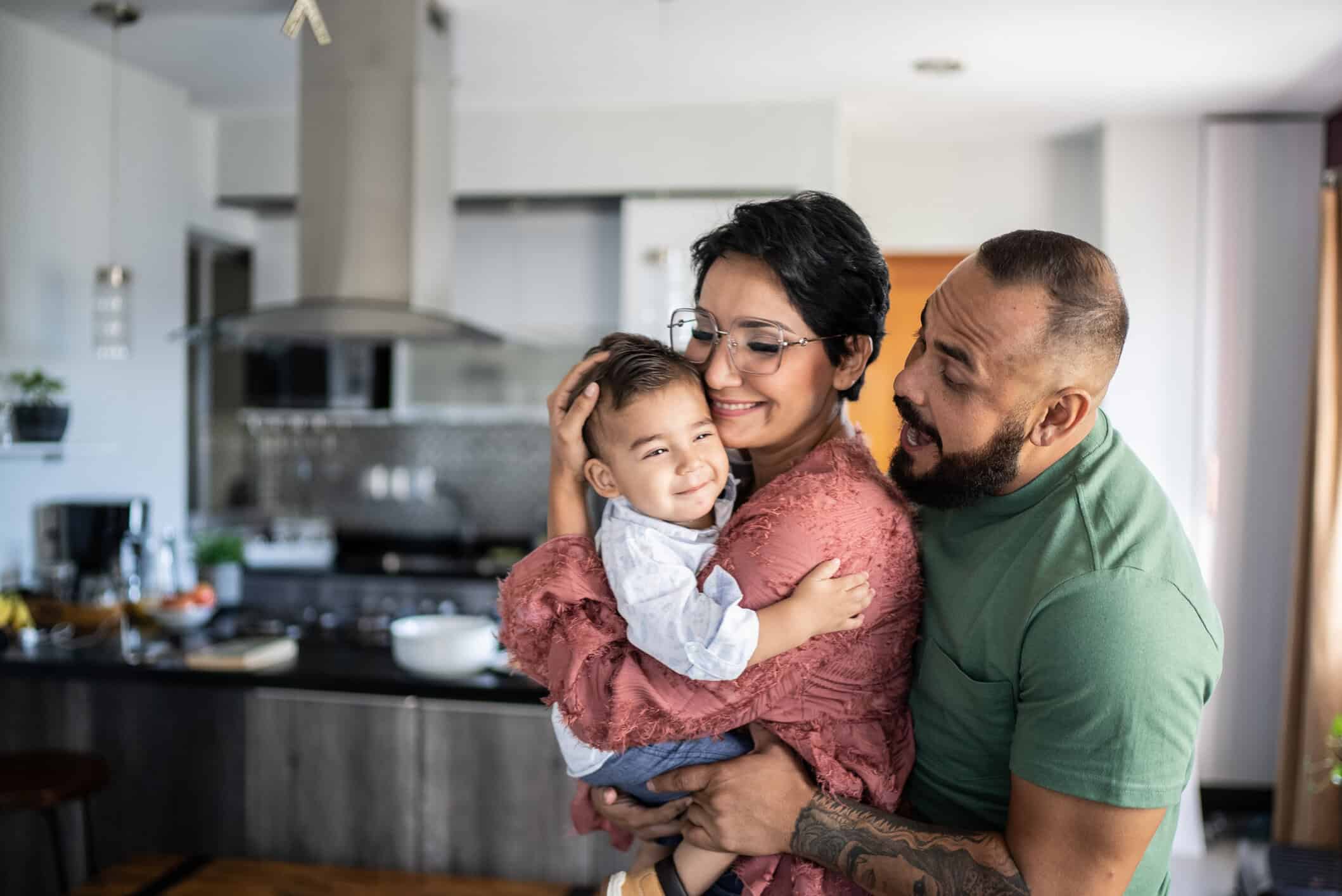 A young family, smiling together